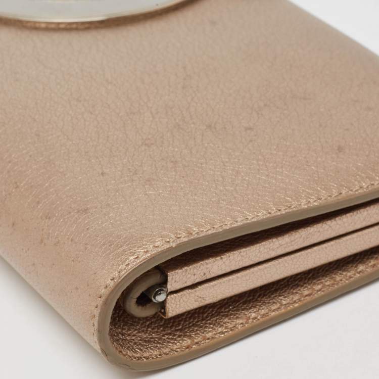 Pre Owned Salvatore Ferragamo Metallic Beige Leather Musa Gancini Clutch