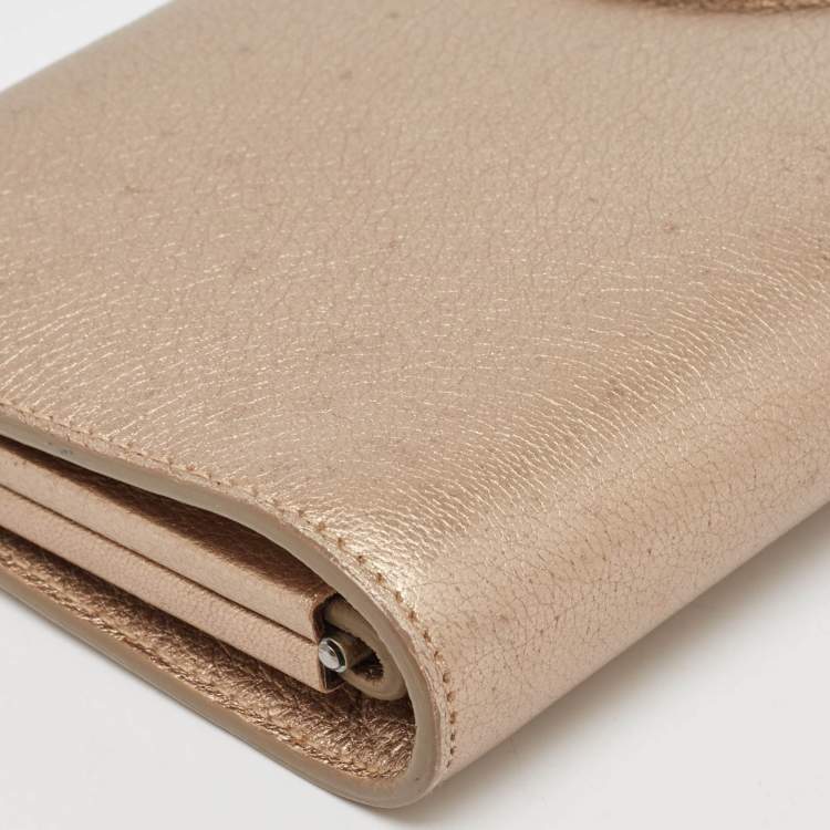 Pre Owned Salvatore Ferragamo Metallic Beige Leather Musa Gancini Clutch