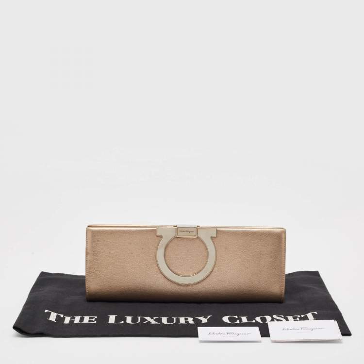 Pre Owned Salvatore Ferragamo Metallic Beige Leather Musa Gancini Clutch
