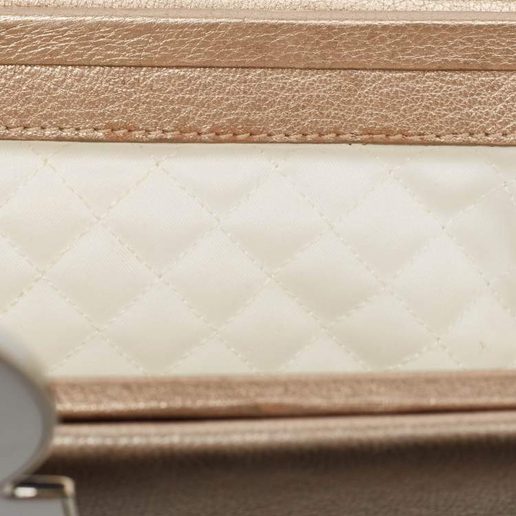 Pre Owned Salvatore Ferragamo Metallic Beige Leather Musa Gancini Clutch