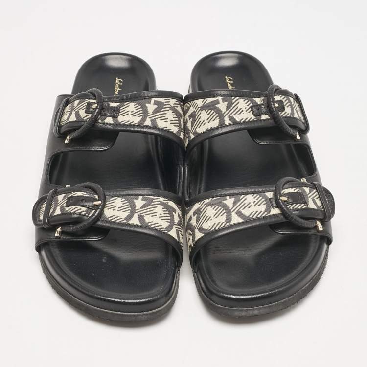 Pre Owned Salvatore Ferragamo Black/Off White Logo Print Fabric and Leather Gairo T Flat Slides Size 39.5