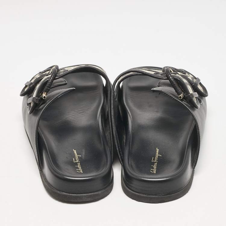 Pre Owned Salvatore Ferragamo Black/Off White Logo Print Fabric and Leather Gairo T Flat Slides Size 39.5