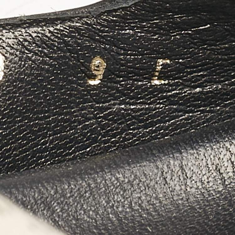 Pre Owned Salvatore Ferragamo Black/Off White Logo Print Fabric and Leather Gairo T Flat Slides Size 39.5
