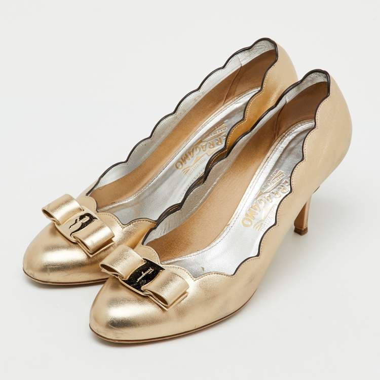 Pre Owned Salvatore Ferragamo Metallic Gold Leather Carla Vara Bow Pumps Size 40