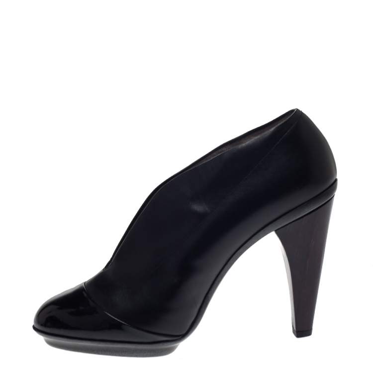 Pre Owned Salvatore Ferragamo Black Leather And Patent Nasya Platform Booties Size 38.5
