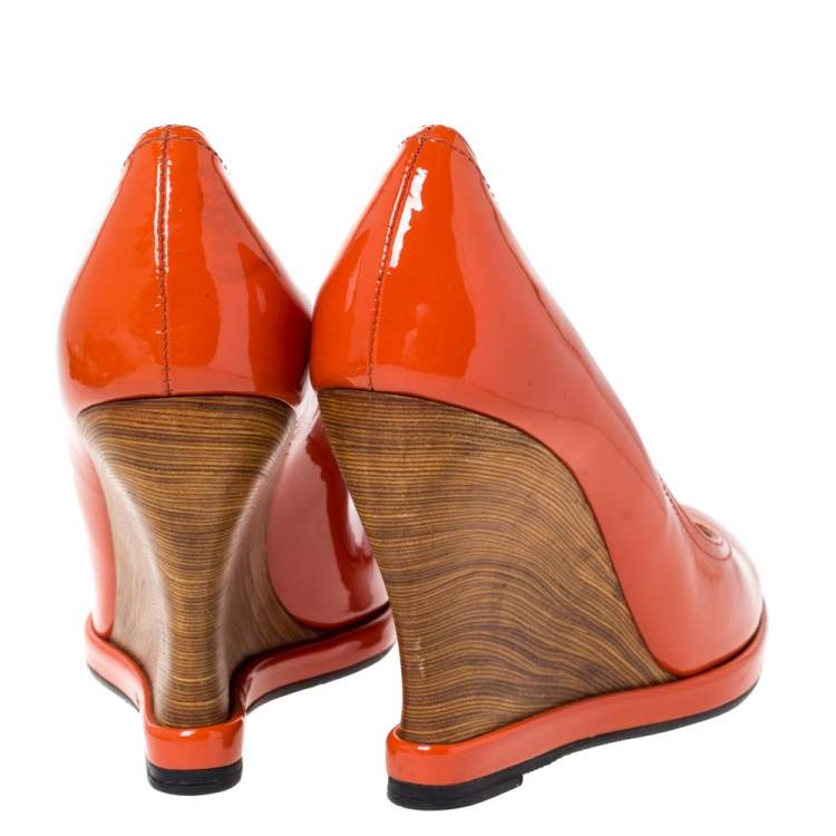 Pre Owned Salvatore Ferragamo Orange Patent Leather Wedge Platform Pumps Size 38.5