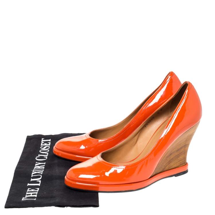 Pre Owned Salvatore Ferragamo Orange Patent Leather Wedge Platform Pumps Size 38.5