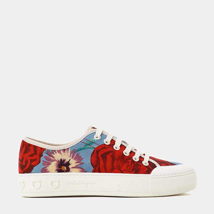 Man with Gucci Sneakers with Floral Decoration before Salvatore