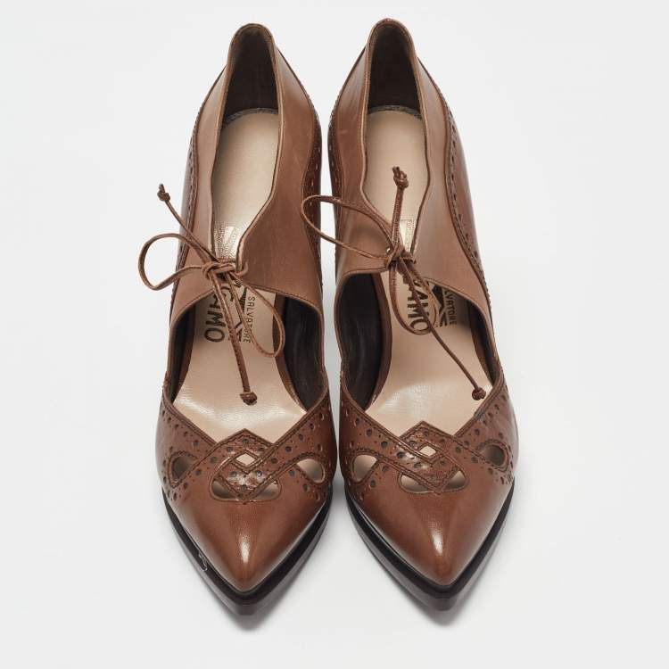 مملوكة مسبقًا Salvatore Ferragamo Brown Brogue Leather Cut Out Lace Pumps Size 37.5