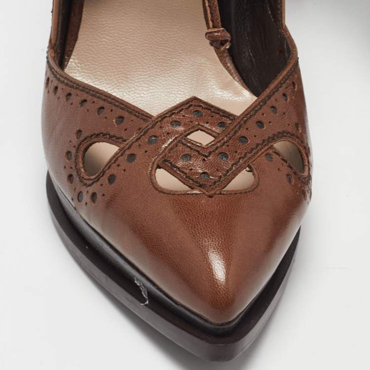مملوكة مسبقًا Salvatore Ferragamo Brown Brogue Leather Cut Out Lace Pumps Size 37.5