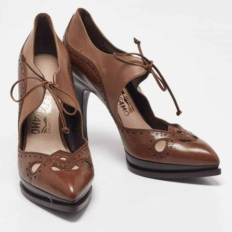 مملوكة مسبقًا Salvatore Ferragamo Brown Brogue Leather Cut Out Lace Pumps Size 37.5