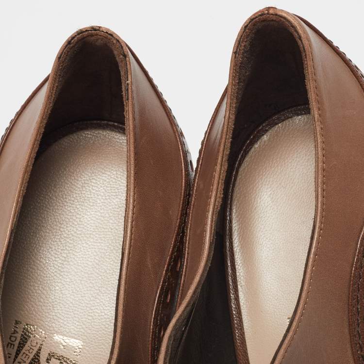مملوكة مسبقًا Salvatore Ferragamo Brown Brogue Leather Cut Out Lace Pumps Size 37.5