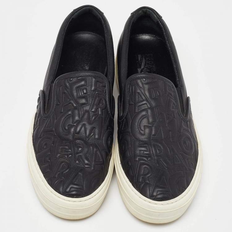 Pre Owned Salvatore Ferragamo Black Leather Logo Embossed Slip On Sneakers Size 39