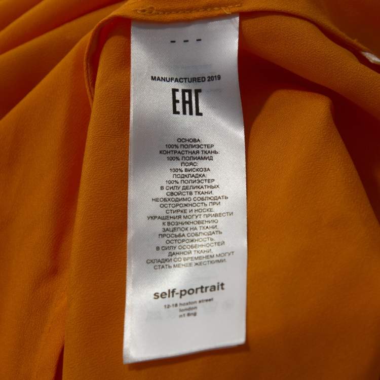 orange off shoulder pleated chiffon dress