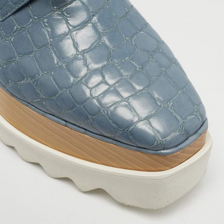 مملوكة مسبقًا حذاء رياضي ستيلا مكارتني إليسي جلد صناعي بنقشة تمساح أزرق/أبيض نعل سميك مقاس 37