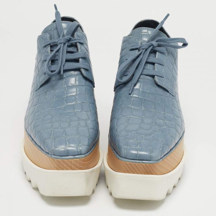 مملوكة مسبقًا حذاء رياضي ستيلا مكارتني إليسي جلد صناعي بنقشة تمساح أزرق/أبيض نعل سميك مقاس 37