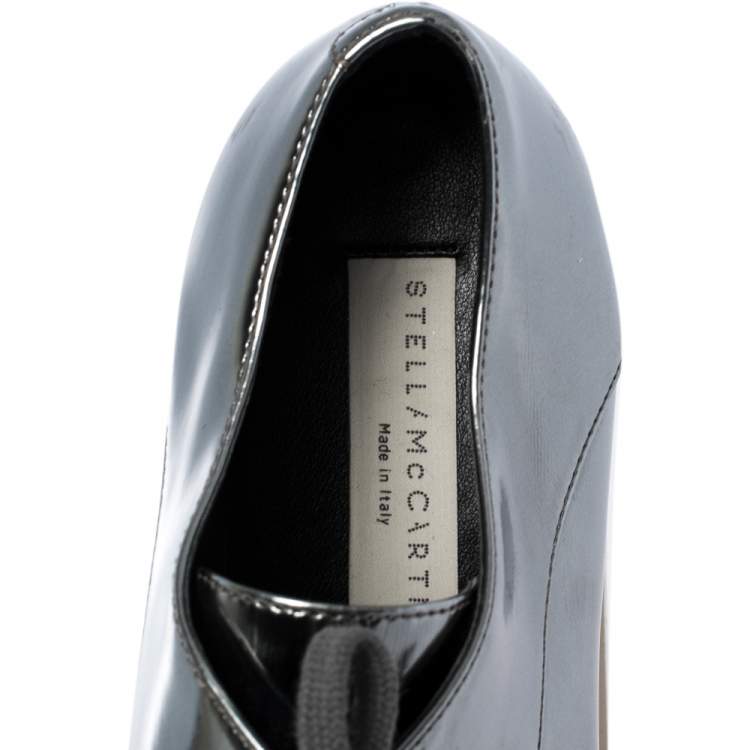 Pre Owned Stella McCartney Metallic Silver Faux Leather Elyse Platform Low Top Sneakers Size 35.5 
