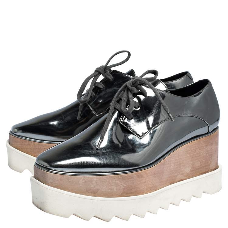 Pre Owned Stella McCartney Metallic Silver Faux Leather Elyse Platform Low Top Sneakers Size 35.5 