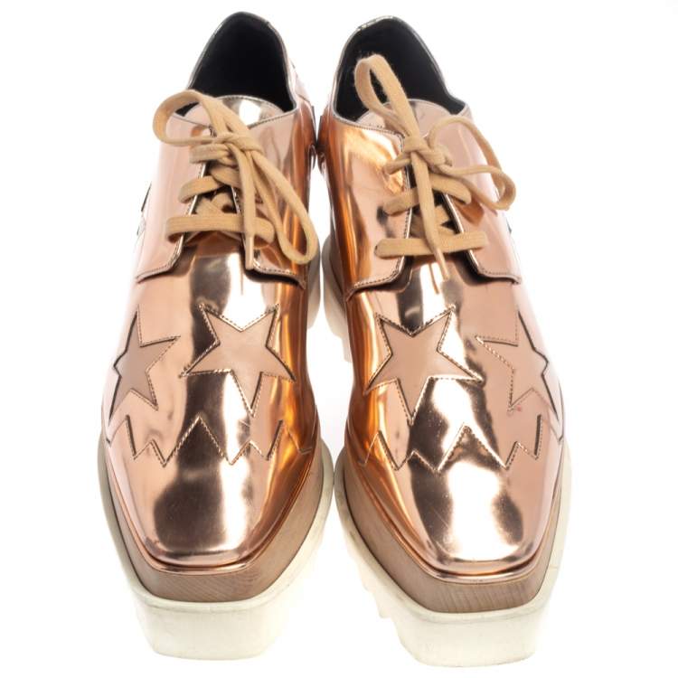 مملوكة مسبقًا Stella McCartney Rose Gold Faux Patent Leather Elyse Star Platform Sneakers Size 38.5