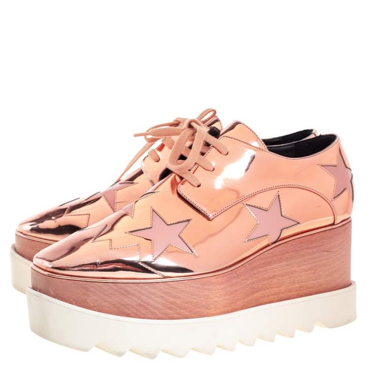 Pre Owned Stella McCartney Metallic Rose Gold Faux Patent Leather Elyse Star Platform Lace Up Sneakers Size 38