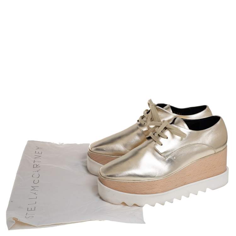 Pre Owned Stella McCartney Gold Faux Leather Wedge Sneakers Size 38.5