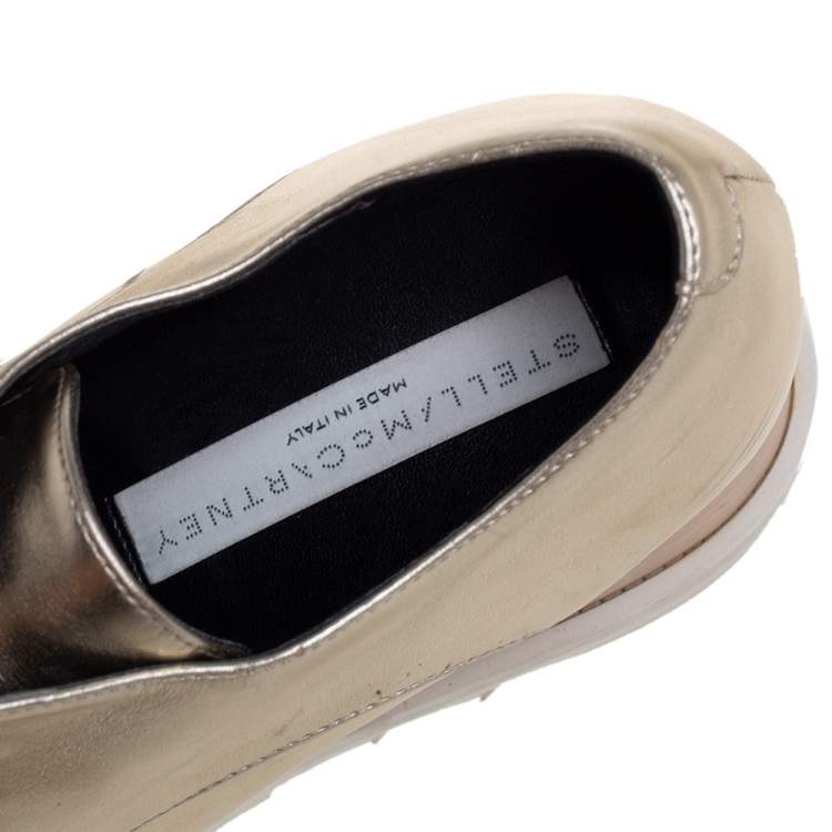 Pre Owned Stella McCartney Gold Faux Leather Wedge Sneakers Size 38.5