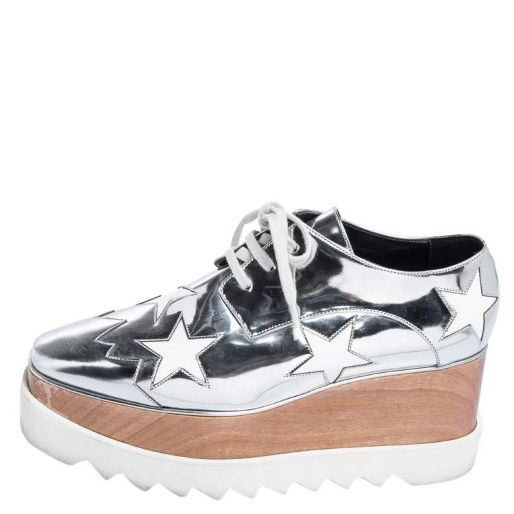 Pre Owned Stella McCartney Silver Faux Patent and Faux Leather Elyse Star Platform Sneakers Size 38.5