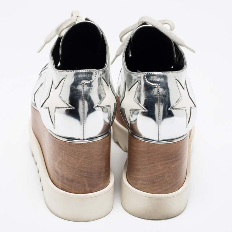 Pre Owned Stella McCartney Silver/White Faux Patent And Faux Leather Elyse Star Platform Lace Up Sneakers Size 38
