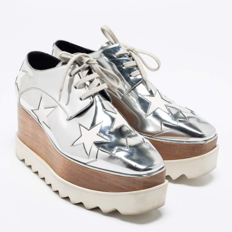 Pre Owned Stella McCartney Silver/White Faux Patent And Faux Leather Elyse Star Platform Lace Up Sneakers Size 38