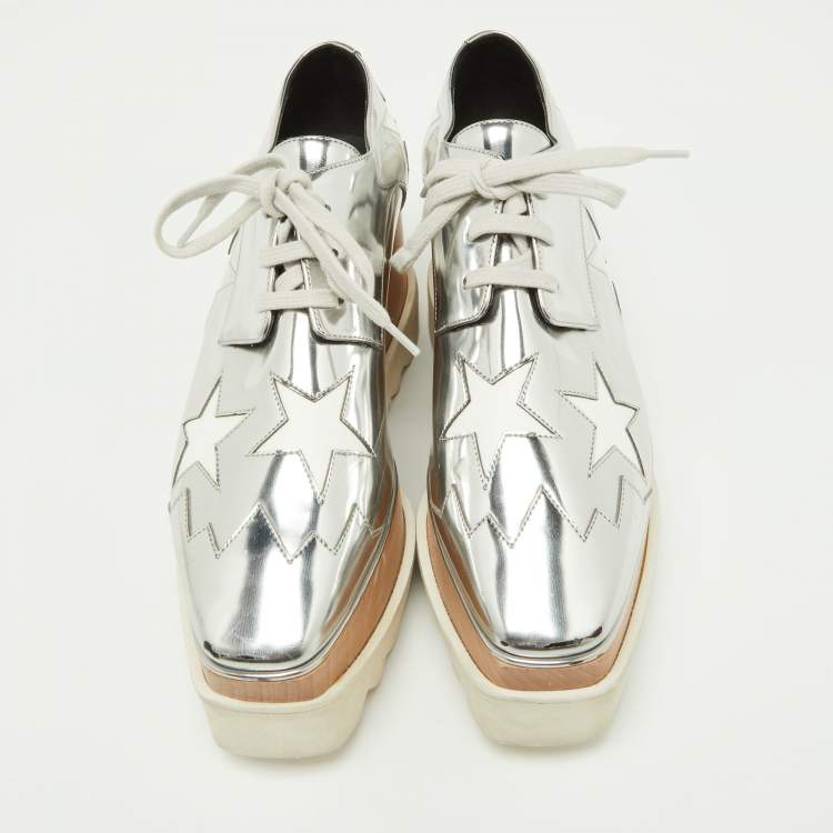 Pre Owned Stella McCartney Silver/White Faux Patent And Faux Leather Elyse Star Platform Lace Up Sneakers Size 38