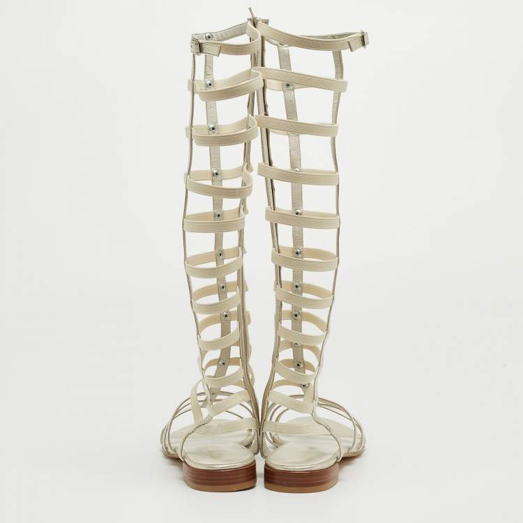 Pre Owned Stuart Weitzman Metallic White Leather and Elastic Gladiator Flat Sandals Size 40
