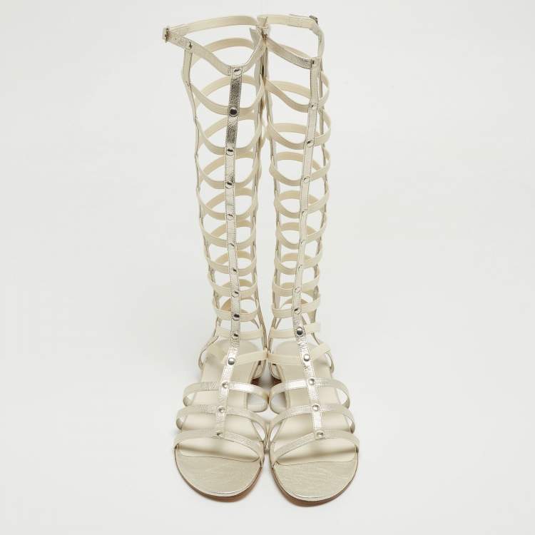 Pre Owned Stuart Weitzman Metallic White Leather and Elastic Gladiator Flat Sandals Size 40