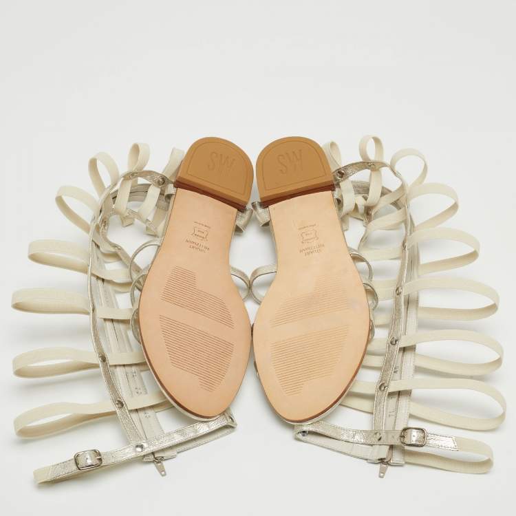 Pre Owned Stuart Weitzman Metallic White Leather and Elastic Gladiator Flat Sandals Size 40