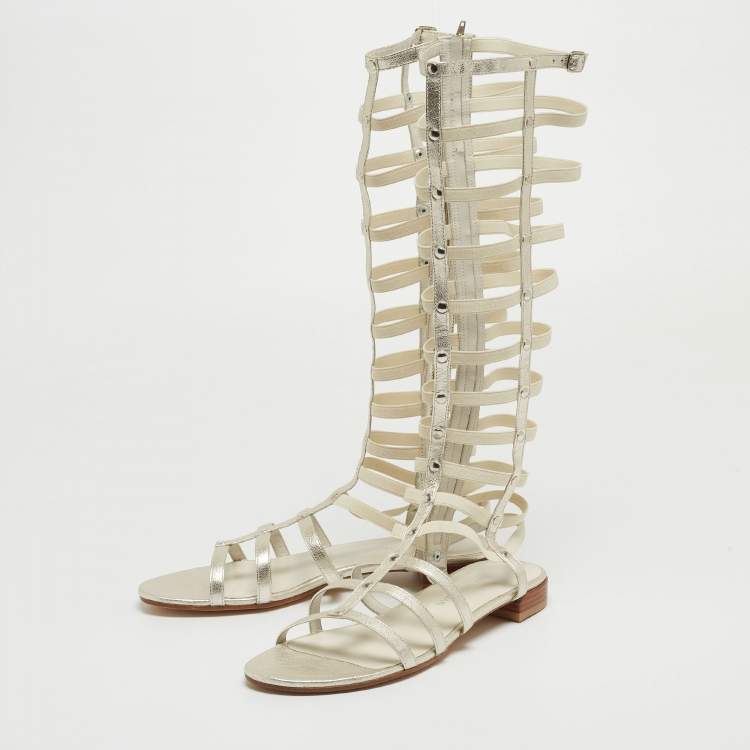 Pre Owned Stuart Weitzman Metallic White Leather and Elastic Gladiator Flat Sandals Size 40