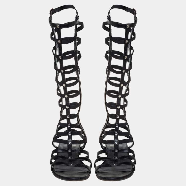 Pre Owned Stuart Weitzman Black Leather and Elastic Gladiator Flat Sandals Size 37.5