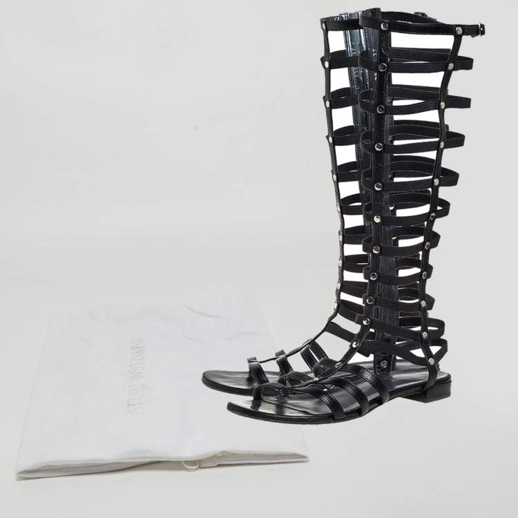 Pre Owned Stuart Weitzman Black Leather and Elastic Gladiator Flat Sandals Size 37.5