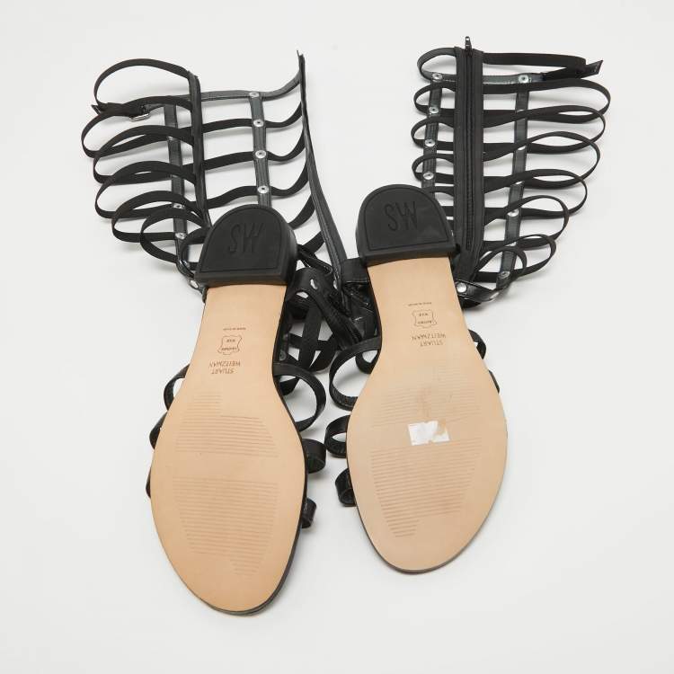 Pre Owned Stuart Weitzman Black Leather and Elastic Gladiator Flat Sandals Size 37.5