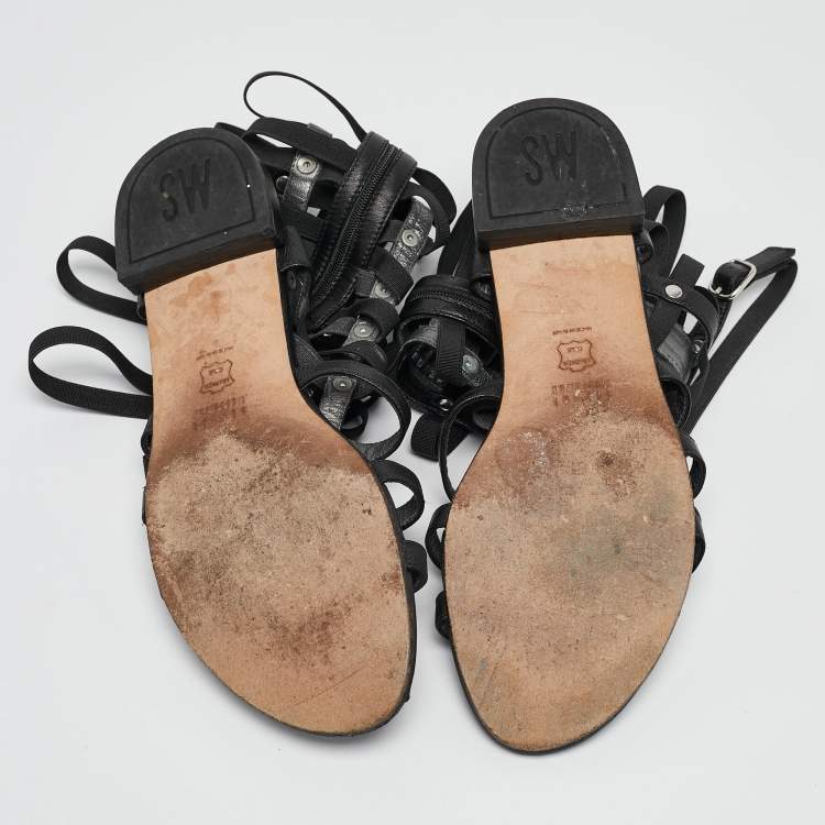 Pre Owned Stuart Weitzman Black Leather Aphrodite Gladiator Flat Sandals Size 38.5 