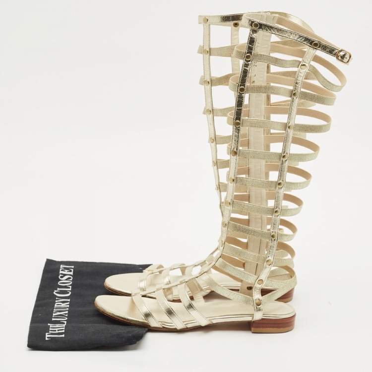 Pre Owned Stuart Weitzman Metallic Gold Leather And Elastic Gladiator Flat Sandals Size 37