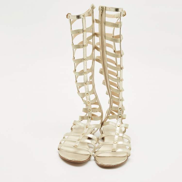 Pre Owned Stuart Weitzman Metallic Gold Leather And Elastic Gladiator Flat Sandals Size 37