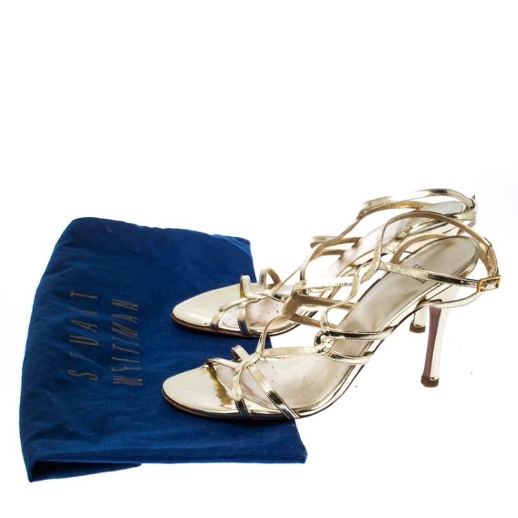 مملوكة مسبقًا Stuart Weitzman Gold Patent Leather Strappy Sandals Size 38