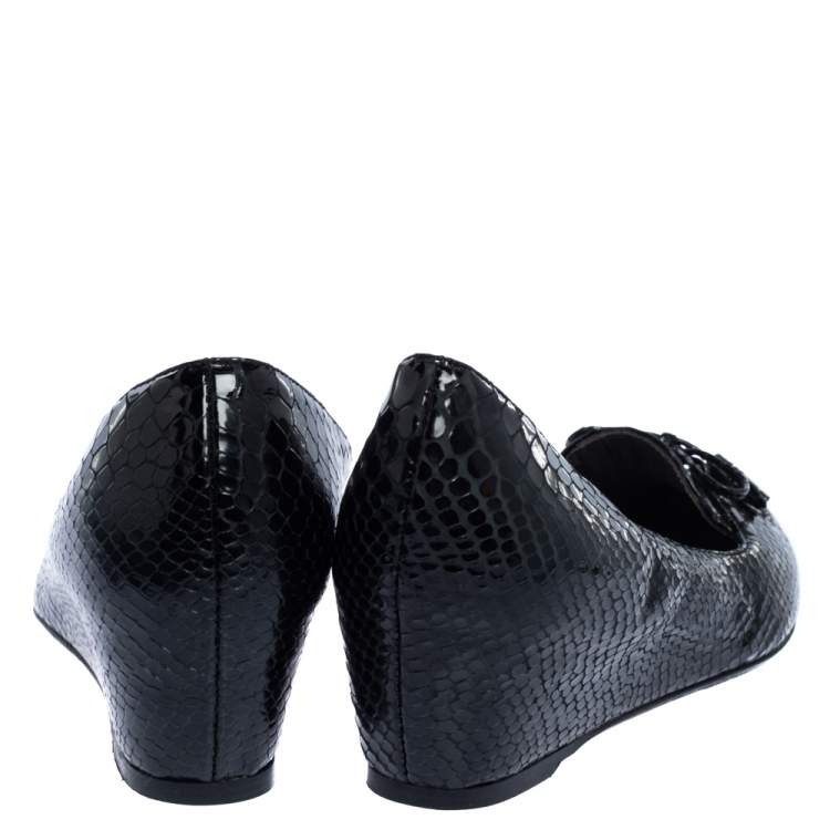 Pre Owned Stuart Weitzman Black Python Embossed Leather Wedge Bow Detail Loafer Pumps Size 38