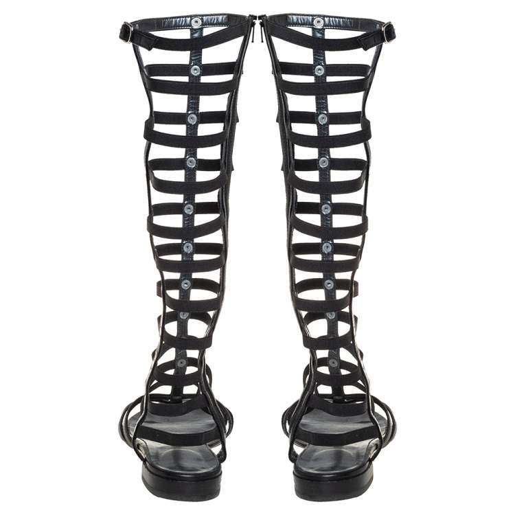 Pre Owned Stuart Weitzman Black Leather And Elastic Gladiator Flats Size 37