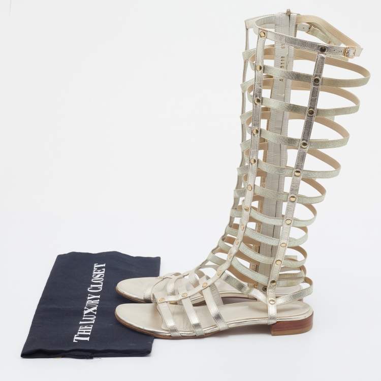 Pre Owned Stuart Weitzman Metallic Gold Leather And Elastic Gladiator Flat Sandals Size 37