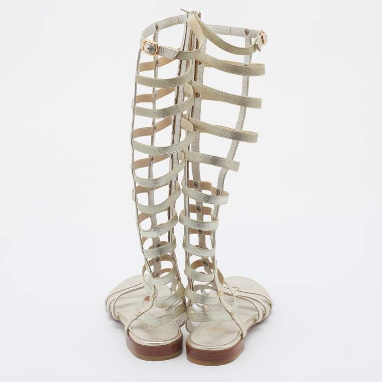 Pre Owned Stuart Weitzman Metallic Gold Leather And Elastic Gladiator Flat Sandals Size 37