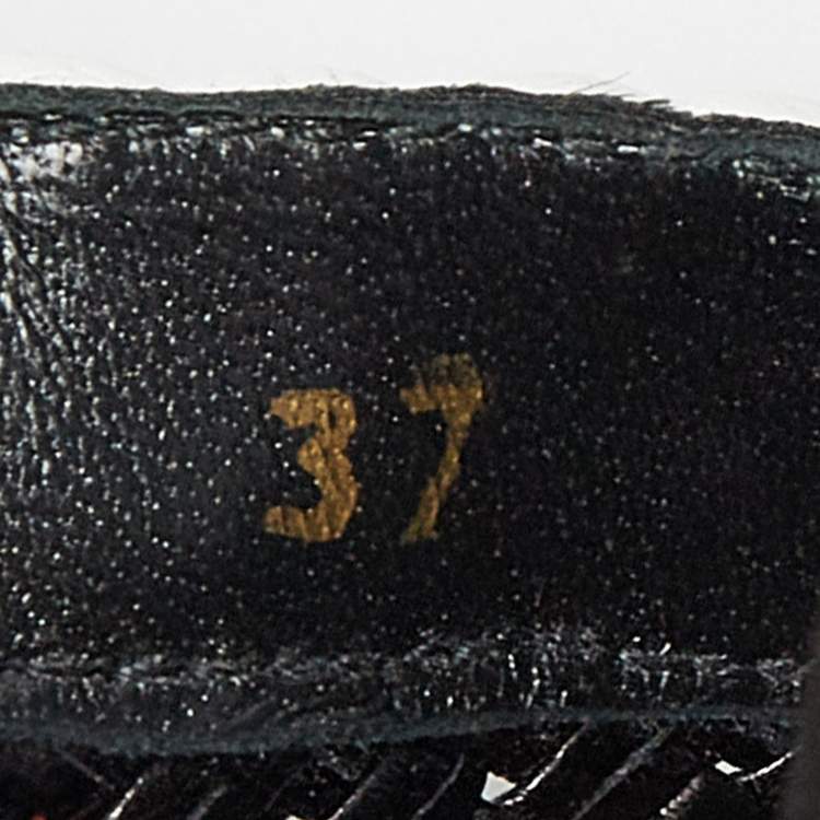 Pre Owned Stuart Weitzman Black/White Woven Leather Indiana Slide Mules Size 37