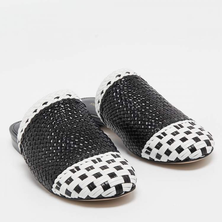 Pre Owned Stuart Weitzman Black/White Woven Leather Indiana Flat Mules Size 35