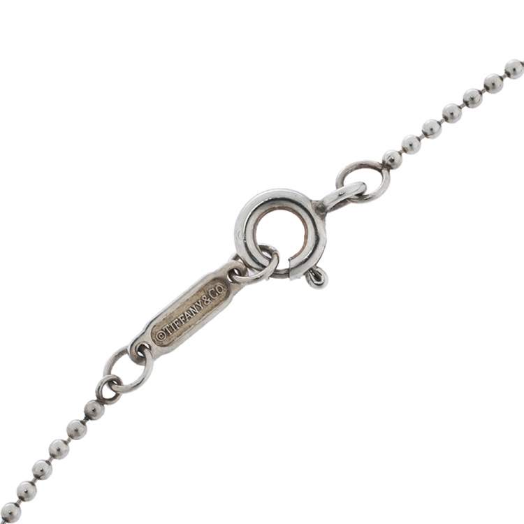 Pre Owned Tiffany & Co. Trefoil Red Enamel Key Pendant Silver Necklace