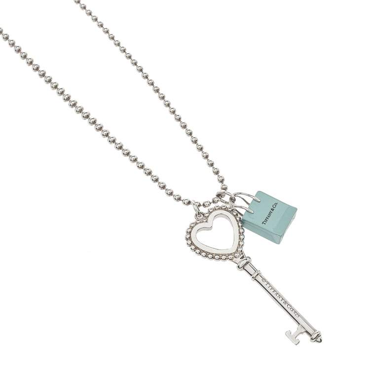 Pre Owned Tiffany & Co.Tiffany Keys Enamel Beaded Heart Key & Bag Charm Silver Pendant Necklace