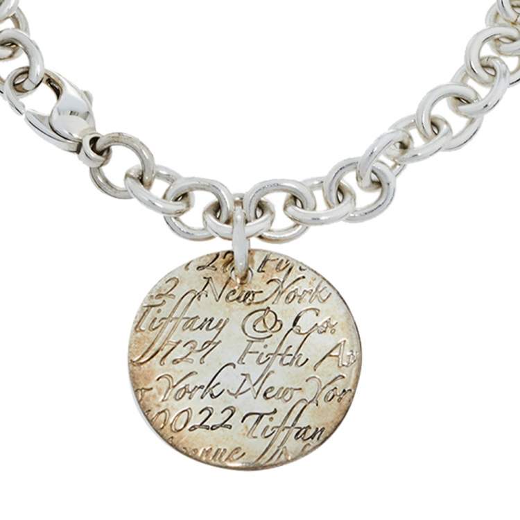 Pre Owned Tiffany & Co. Notes Round Tag Charm Sterling Silver Bracelet